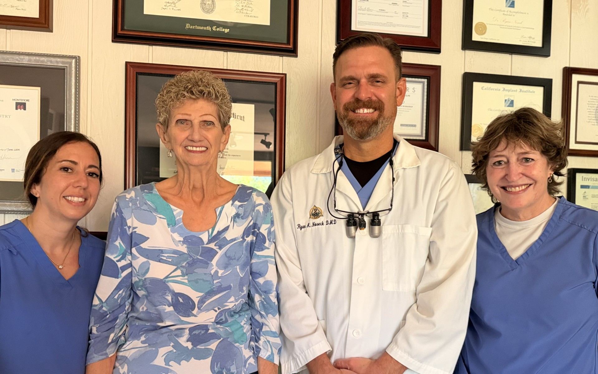 About Us Team Pic Dr. Ryan Noseck with the dental care team