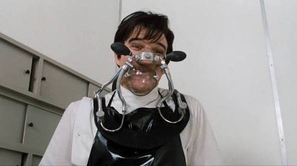 Steve Martin Nitrous Oxide1 Film scene showing a dentist wearing a gas mask