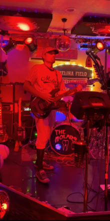 The Molars1 Dr. Ryan Noseck playing bass onstage with The Molars